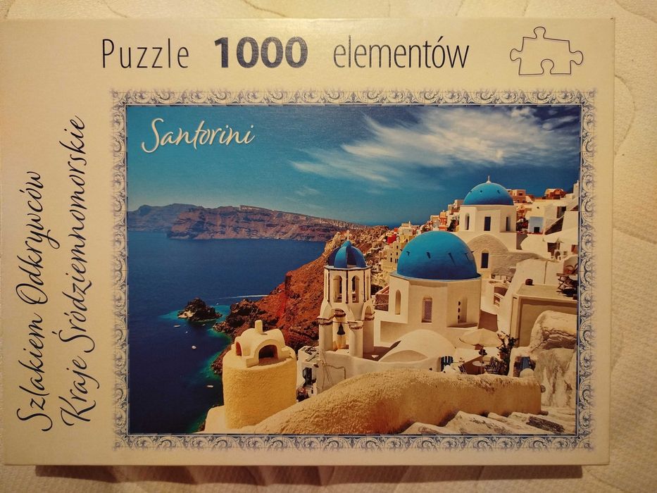 Puzzle 1000el. Szlakiem Odkrywców: Kraje Śródziemnomorskie - Santorini