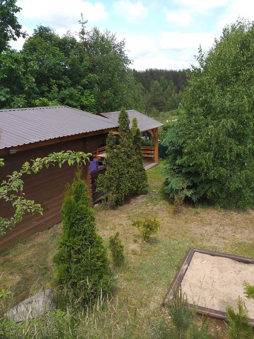 drewniany domek letniskowy nad jeziorem Wdzydze