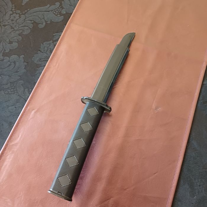 Espada samurai retráctil de plastico