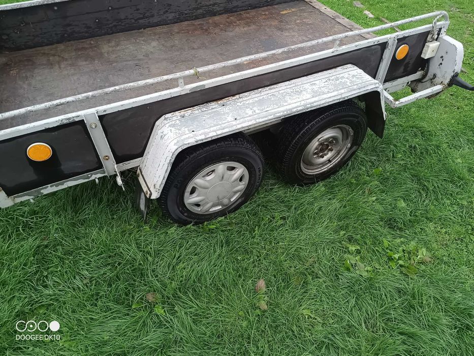 Przyczepka do minikoparki tandem dwuosiowa