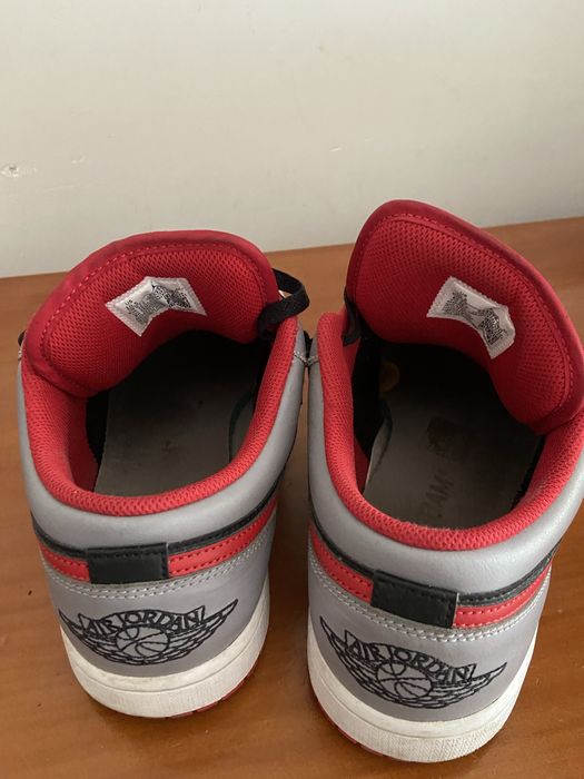 Jordan 1 low preto vermelho e branco