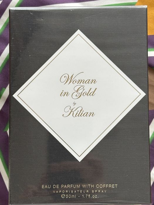 Kilian woman in gold