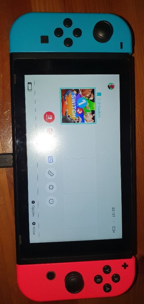 Nintendo Switch com jogo e 2 volantes