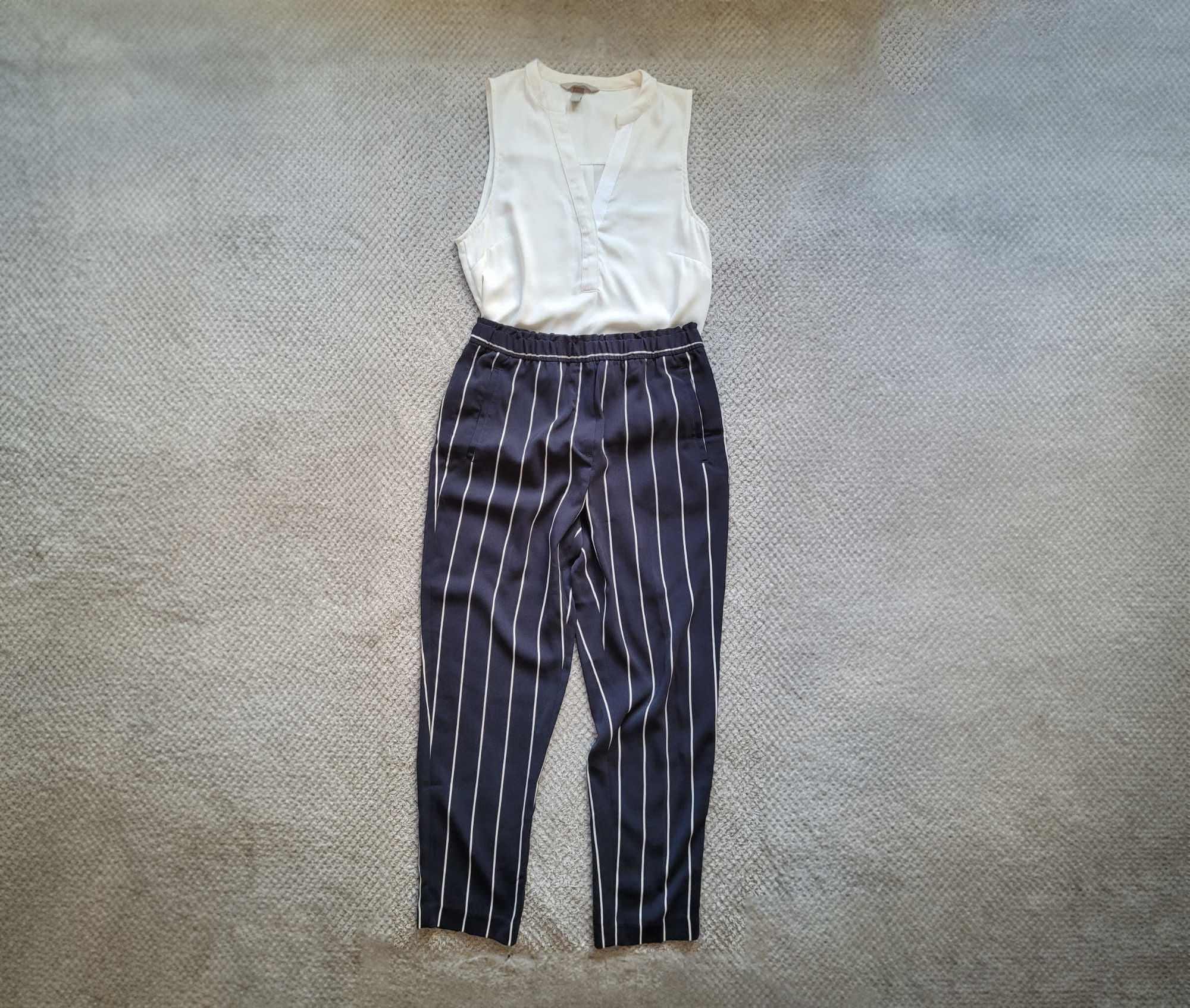 Eleganckie granatowe spodnie w białe paski, gumka w pasie, H&M 38