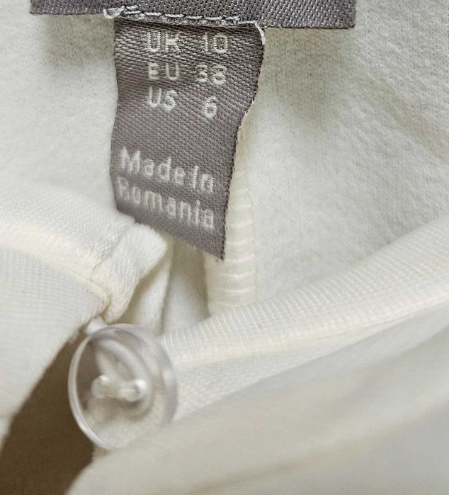 Piękna elegancka sukienka wiązana z głębokim dekoldem rozm. M/ 38