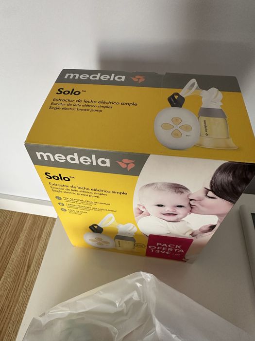 Extrator de leite e sacos de conservação Medela