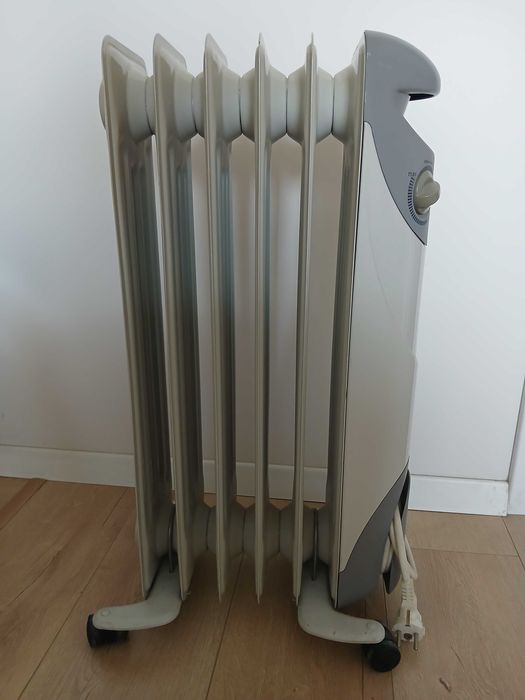 Масляний радіатор обігрівач камін EWT Germany