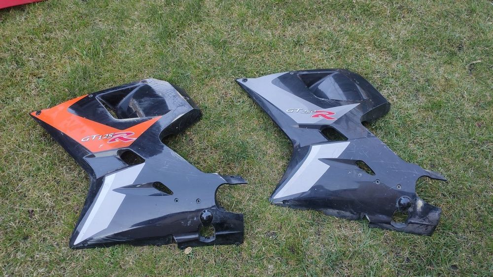 EU OSŁONA OWIEWKA BOK LEWA HYOSUNG GT 125 250R