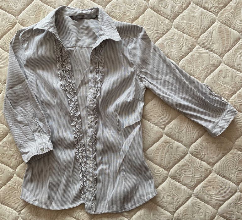 Blusa brilhante de manga 3/4 da Zara