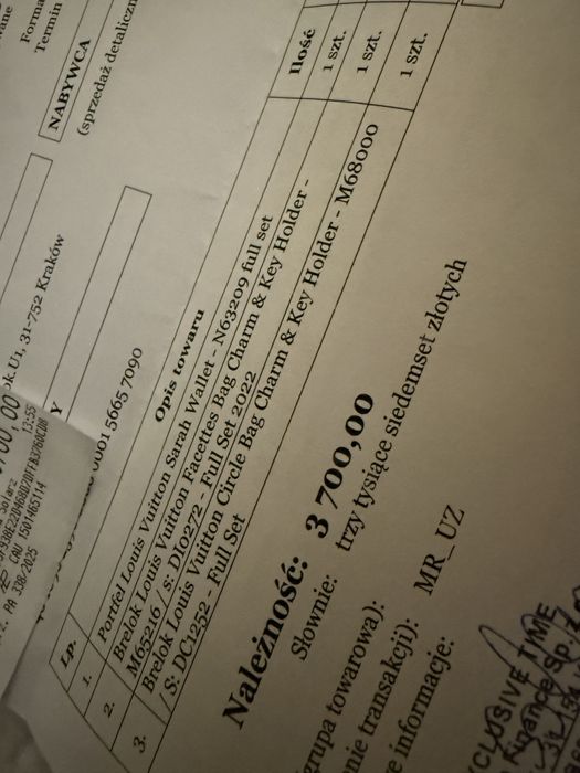 Breloczek Louis Vuitton z paragonem