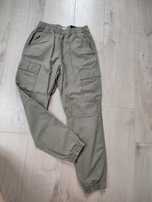 Joggery bojówki H&M 158