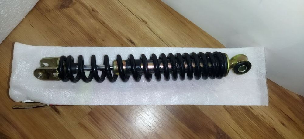 Задній амортизатор скутер універсальний