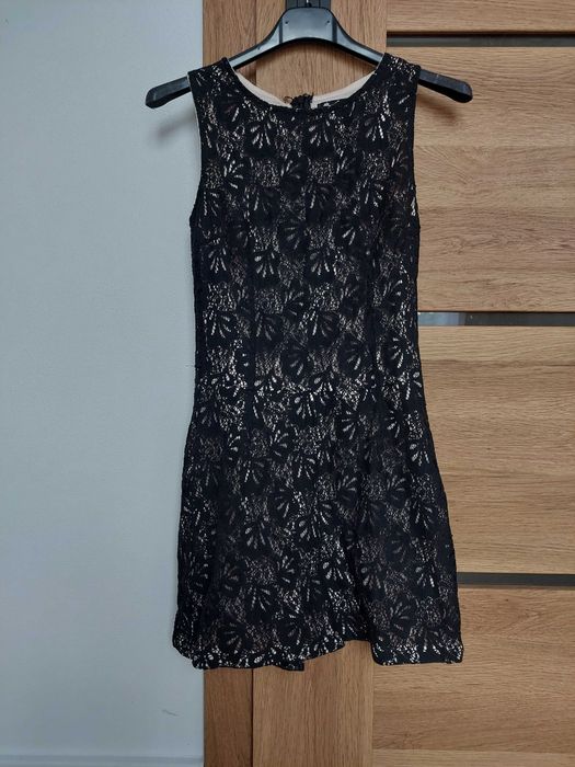 Koronkowy kombinezon czarno bezowy 36