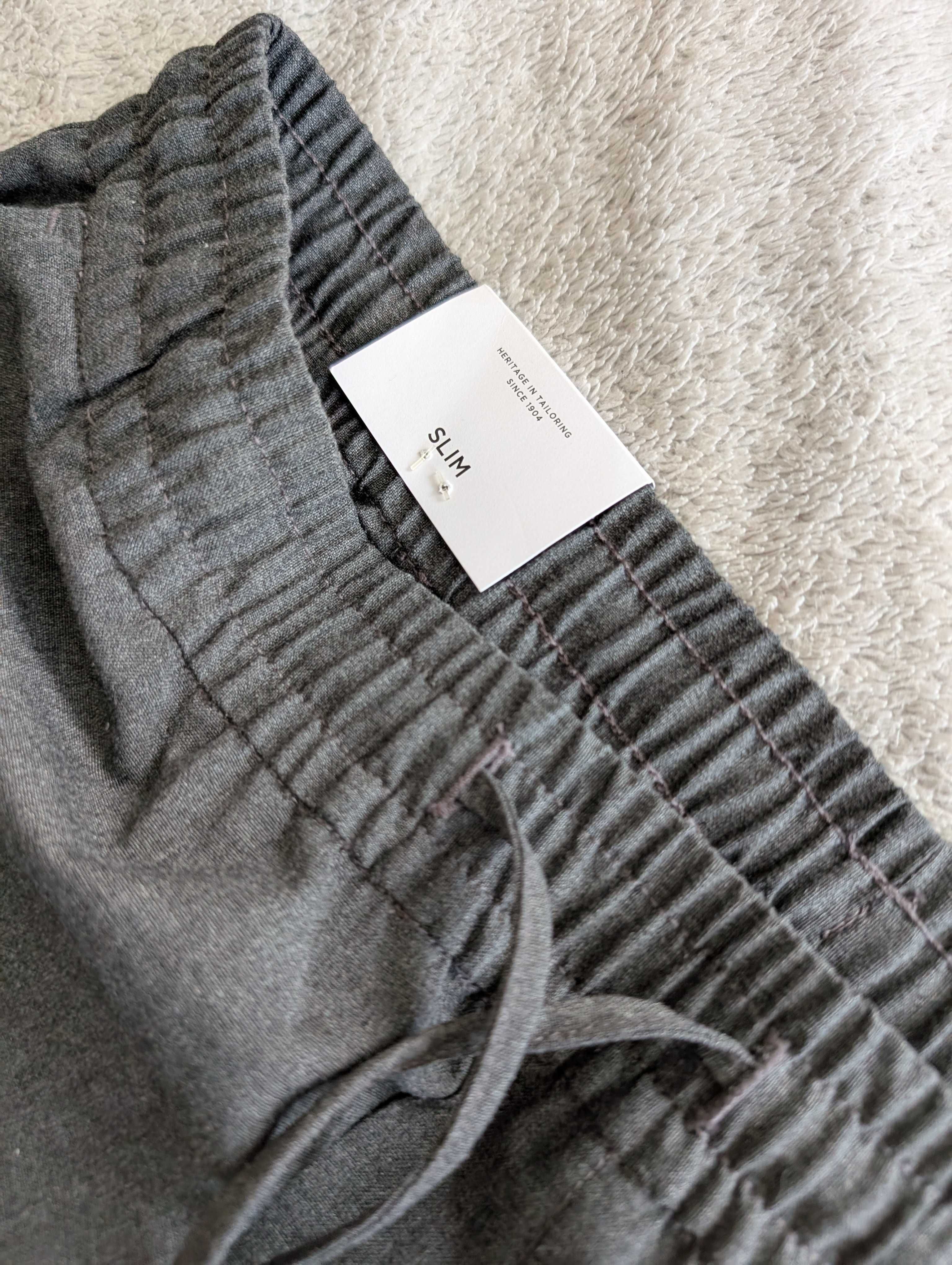Nowe szare eleganckie spodnie joggery na gumie Burton Slim 34 R