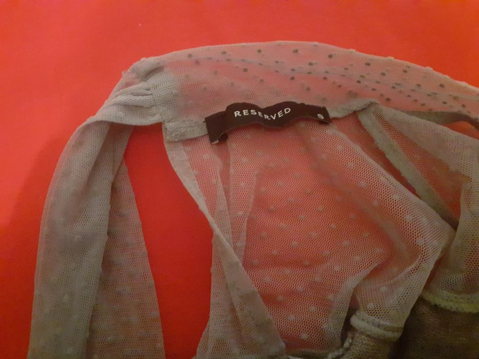 Atrakcyjny sweterek  Marki Reserved