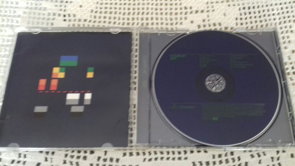 CD'S de três grupos diferentes