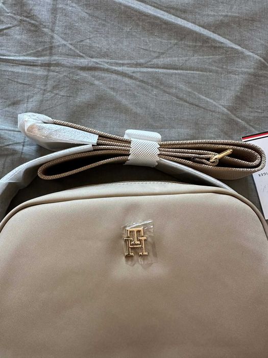 mala tommy nova e original