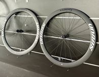 CARBONOWY zestaw kòł szosowych UNAAS HARD H50disc