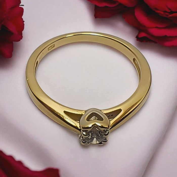 Złoty pierścionek 585 brylant  0,10 CT certyfikat , serce waga  2,27 g