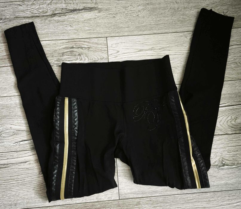 Damskie legginsy ze złotym lampasem
