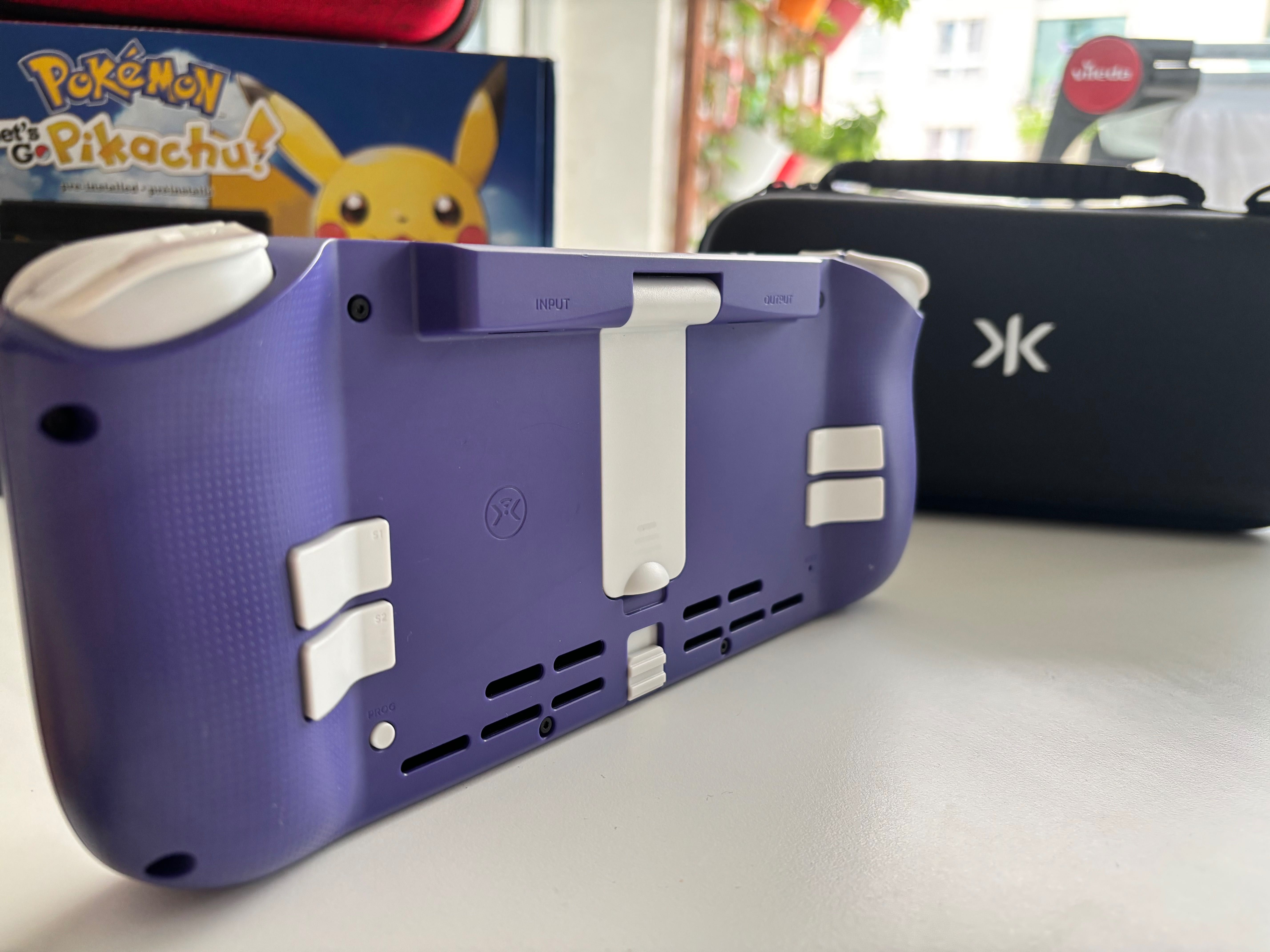 Nintendo Switch Let's Go Pikachu & Eevee Edition + Gry + Nitro Deck