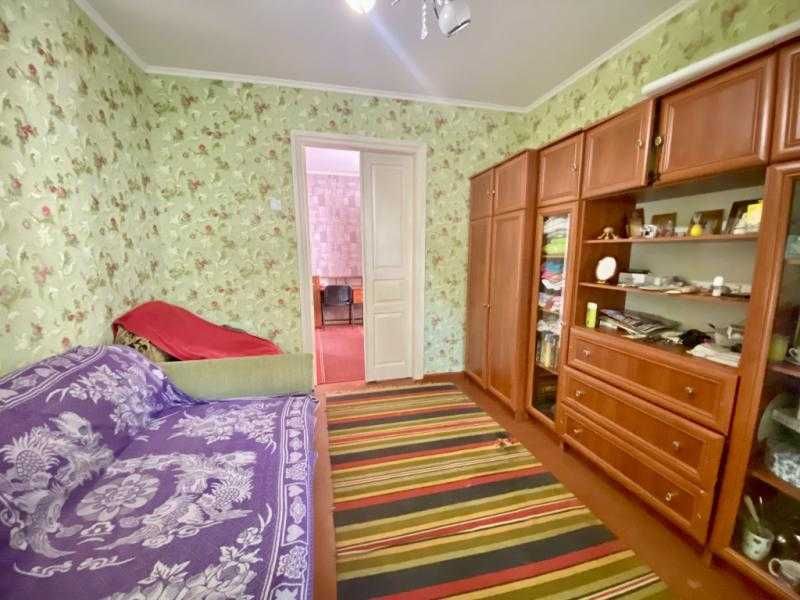 Продам уютный дом в тихом районе.