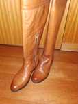 Botas em pele, pelo joelho