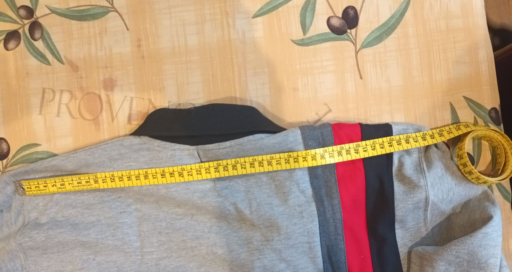 Polo de manga comprida e fecho