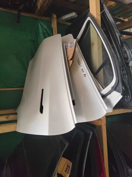 Двері передні задні голі, в зборі Tesla Model Y 2020-2024