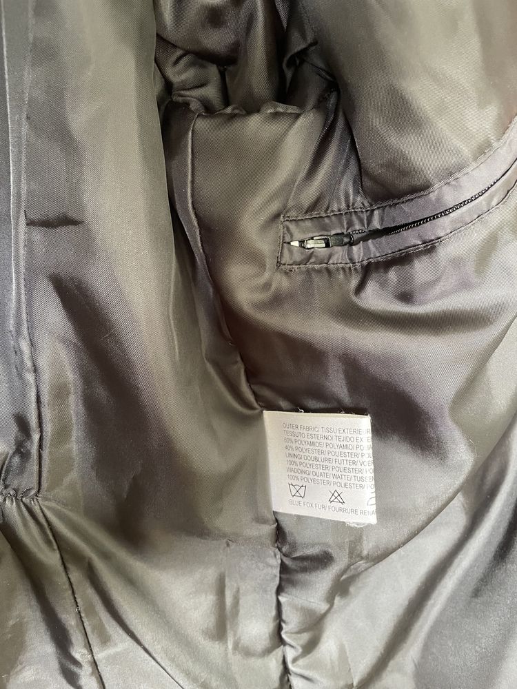 Casaco acolchoado com gola de pêlo