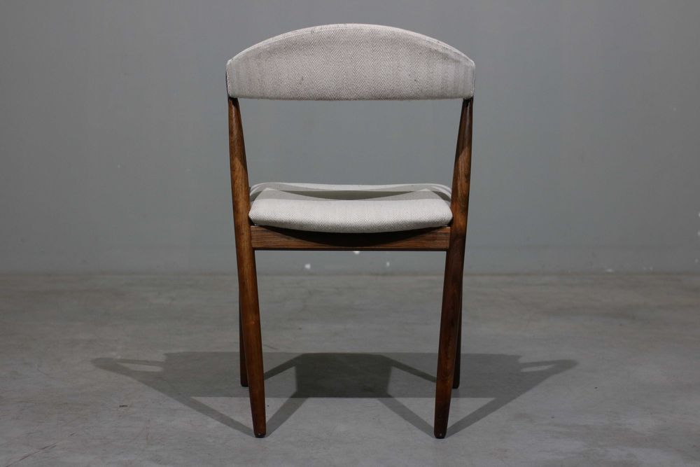 Cadeiras Kai Kristiansen modelo 31 em pau santo | Schou Andersen