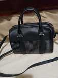 Mala com tachas Zara