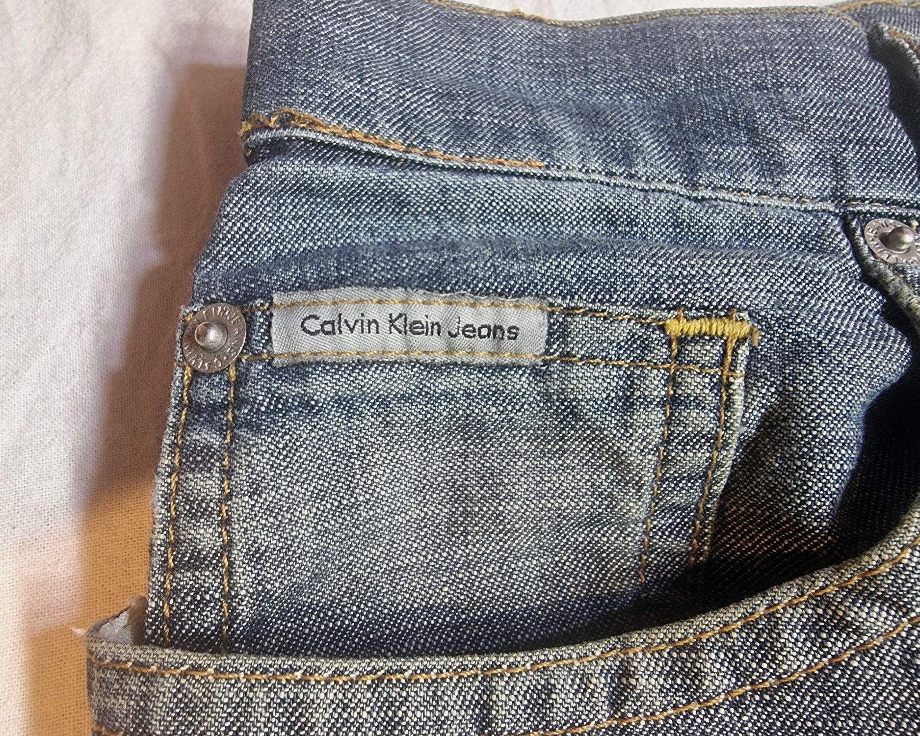 Jeansy Calvin Klein roz. 32 spodnie denim slim fit chinos