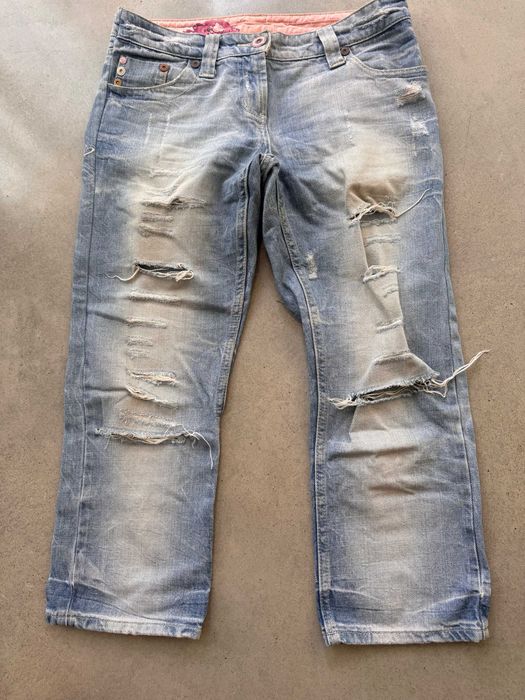 Spodnie z dziurami za kolano River Island rozm. 12