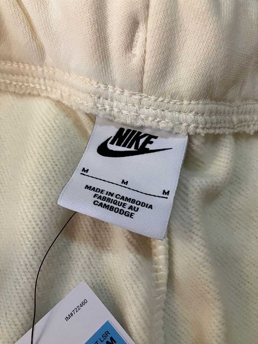 Waniliowe spodnie dresowe Nike roz.M