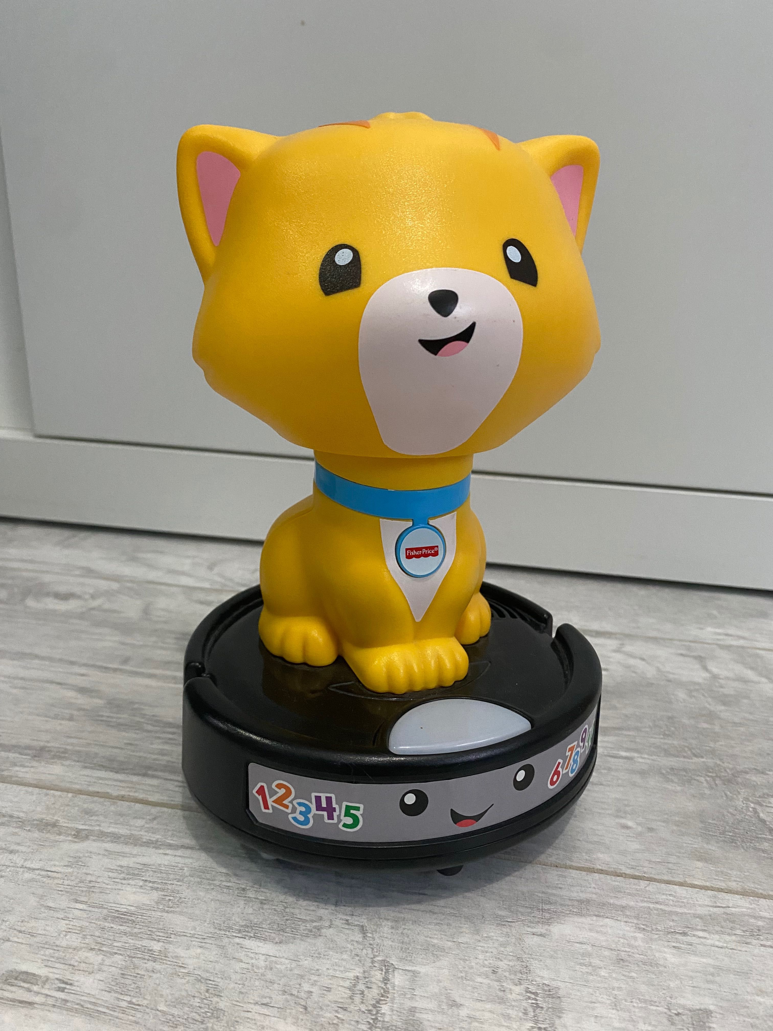 Kot na odkurzaczu Fisher Price zabawka