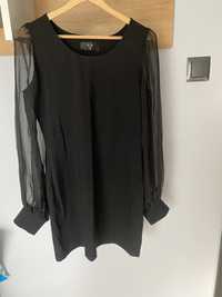 Czarna krótka sukienka z bufiastymi rękawami 38