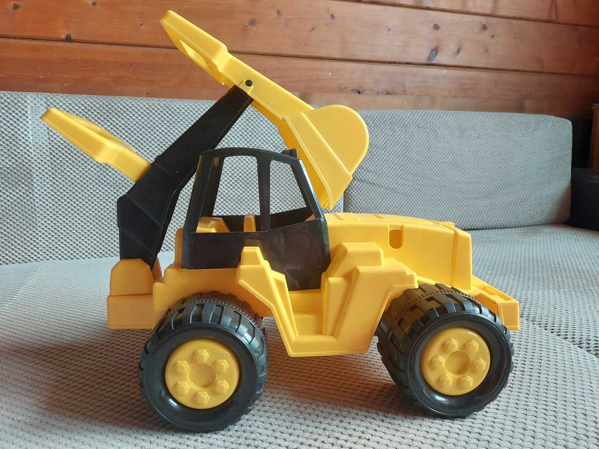 nowy traktor - koparka
