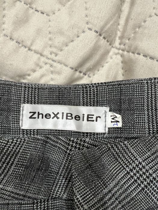 Штани в клітинку