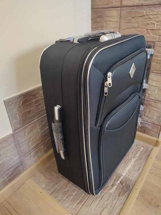 Дорожня валіза на колесах Style середня чорна
