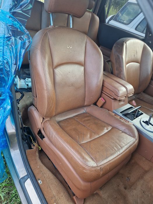 Srodek infiniti fx35 brązowy fotele kanapa boczki dywan