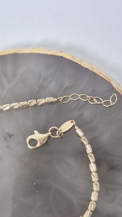 Nowa złota bransoletka, ruchoma, nietypowy splot,sztywna, 585