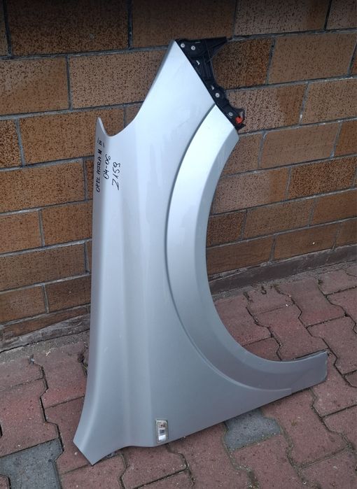 Błotnik Opel Astra H III   Z157