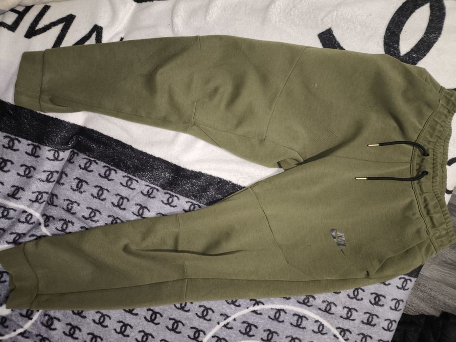 Зелені штани  nike tech flis