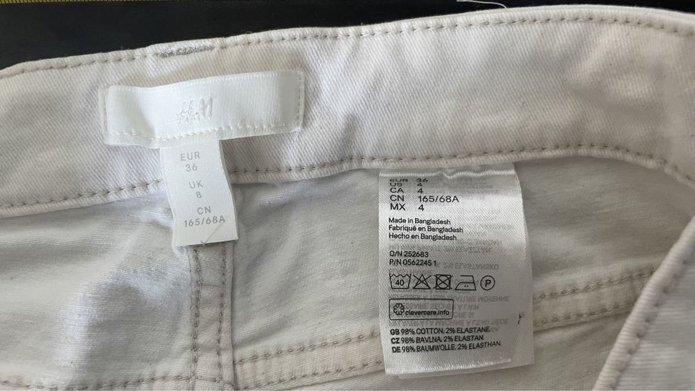 Białe spodnie jeans na lato H&M