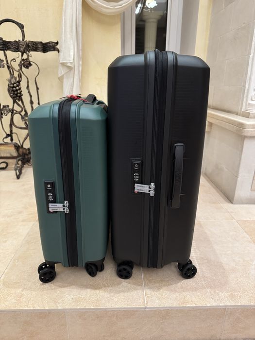 American tourister мала та снредня нові валізи
