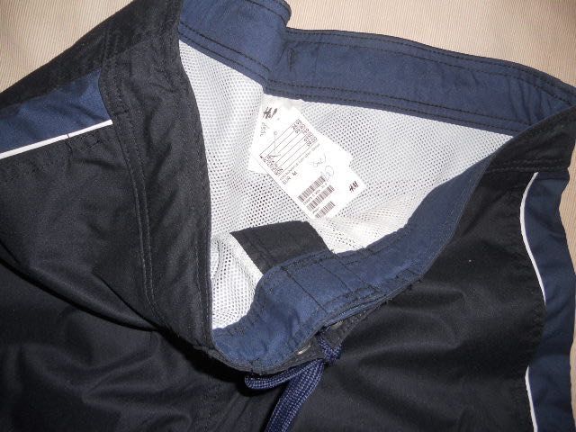 H&M nowe spodnie męskie bermudy r.M