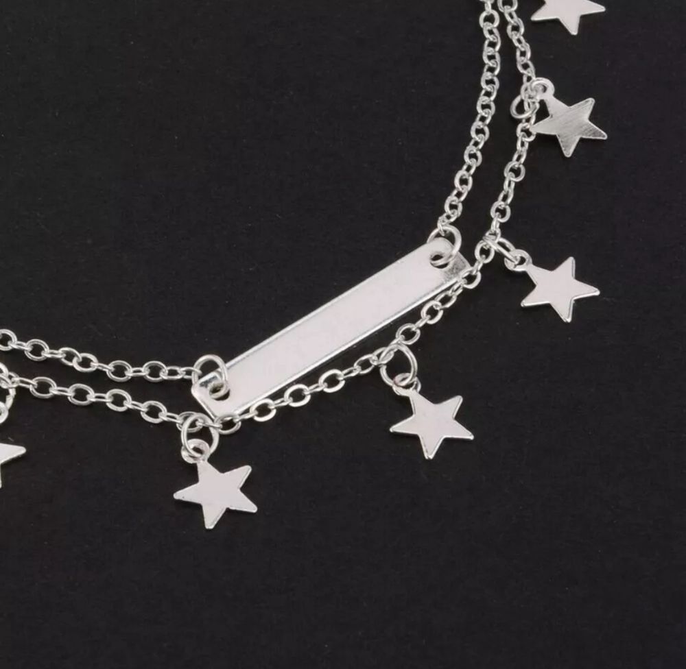 Pulseira pe dupla estrelas silver nova