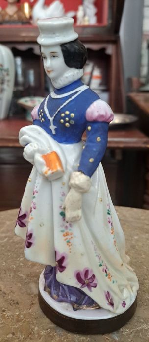 Boneca de porcelana antiga
