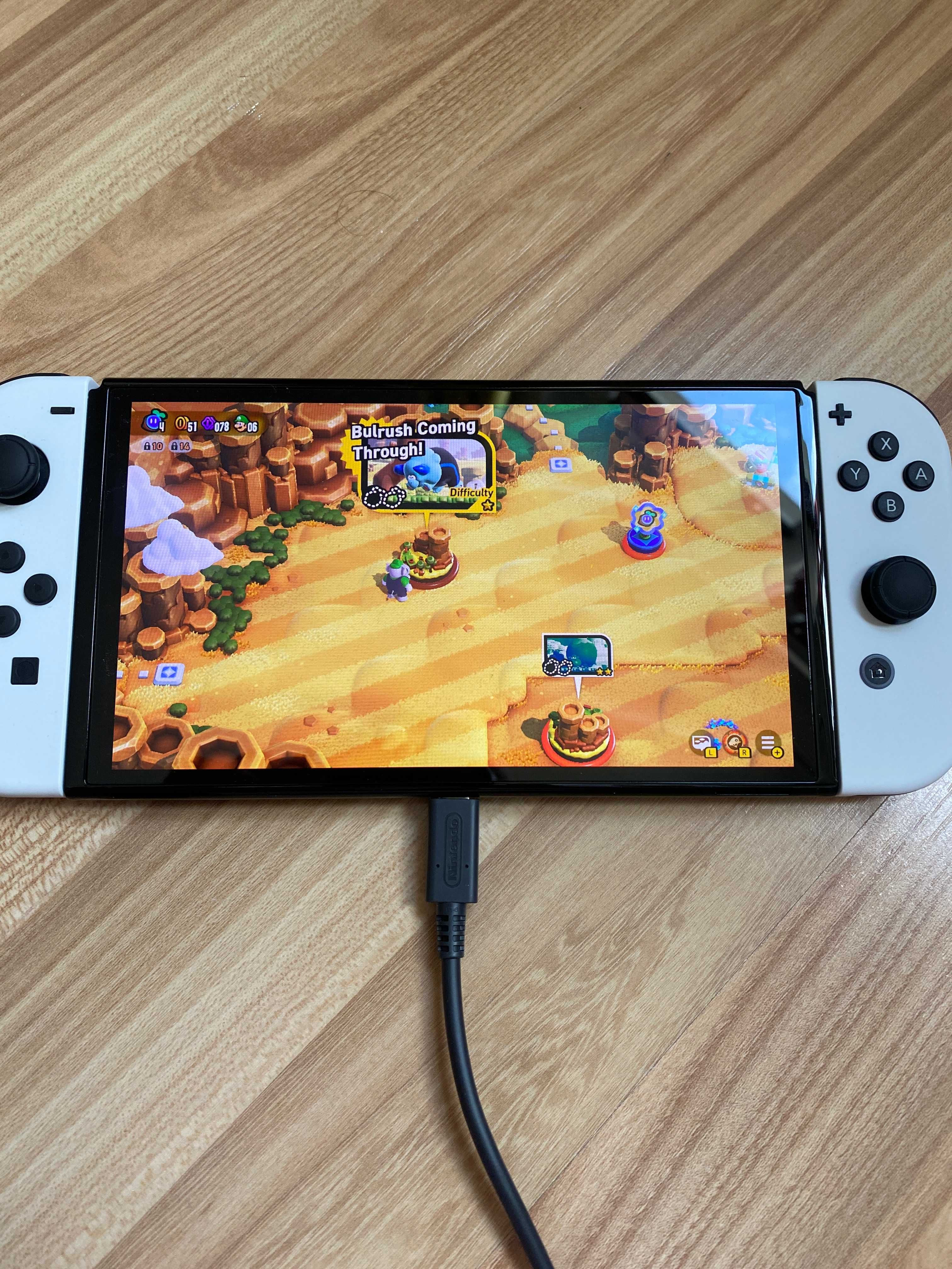 Nintendo Switch OLED + akcesoria (stan idealny), zakupione 12.2024
